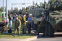 The troops are welcomed by the public, who are given a tour of the various vehicles that will compose the roll past